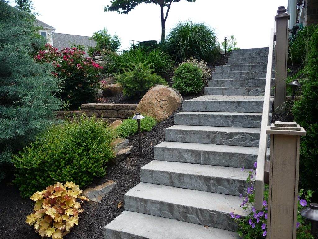 outdoor stairs next to outdoor plants